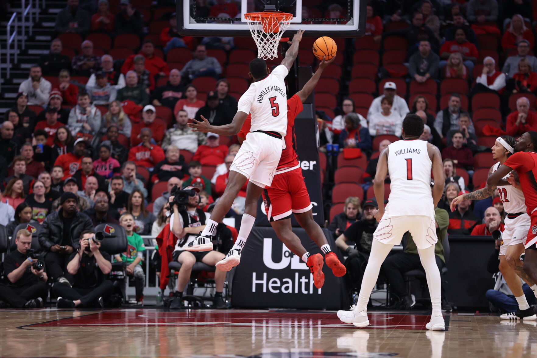 Brandon Huntley-Hatfield blocks a shot against NC State.JPG